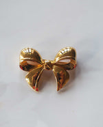 Load image into Gallery viewer, LIA Signed Bow Brooch
