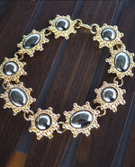 Load image into Gallery viewer, Grey Cabochon Gold Tone Statement Choker
