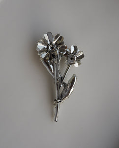 Silvertone flower brooch