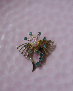 Gold Tone Blue Rhinestone brooch