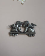 Load image into Gallery viewer, JJ Signed Silver Tone Angels Brooch
