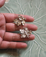 Load image into Gallery viewer, Silver Tone Coro Signed Leaf Clip Ons
